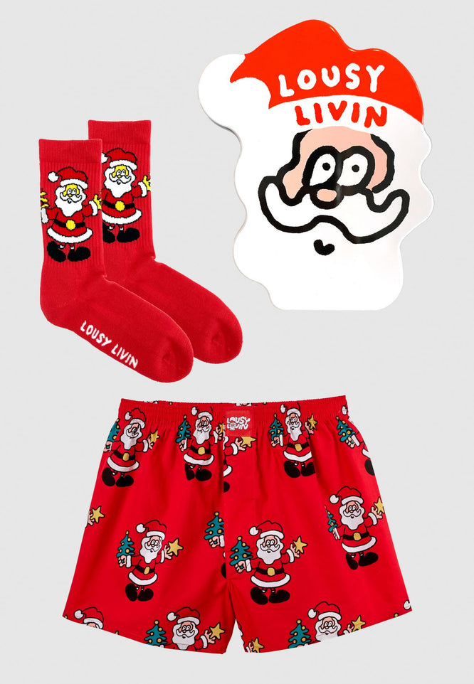 Boîte-cadeau rouge pour le Père Noël et ses chaussettes